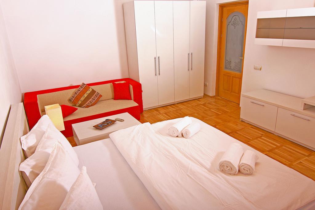 Nirvana Accommodation Βουκουρέστι Δωμάτιο φωτογραφία